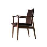 Rivage | Dining chair
Walnut oil | Brown